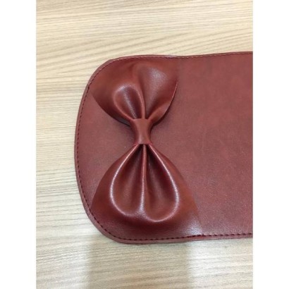 Δερμάτινο καπάκι με φιόγκο